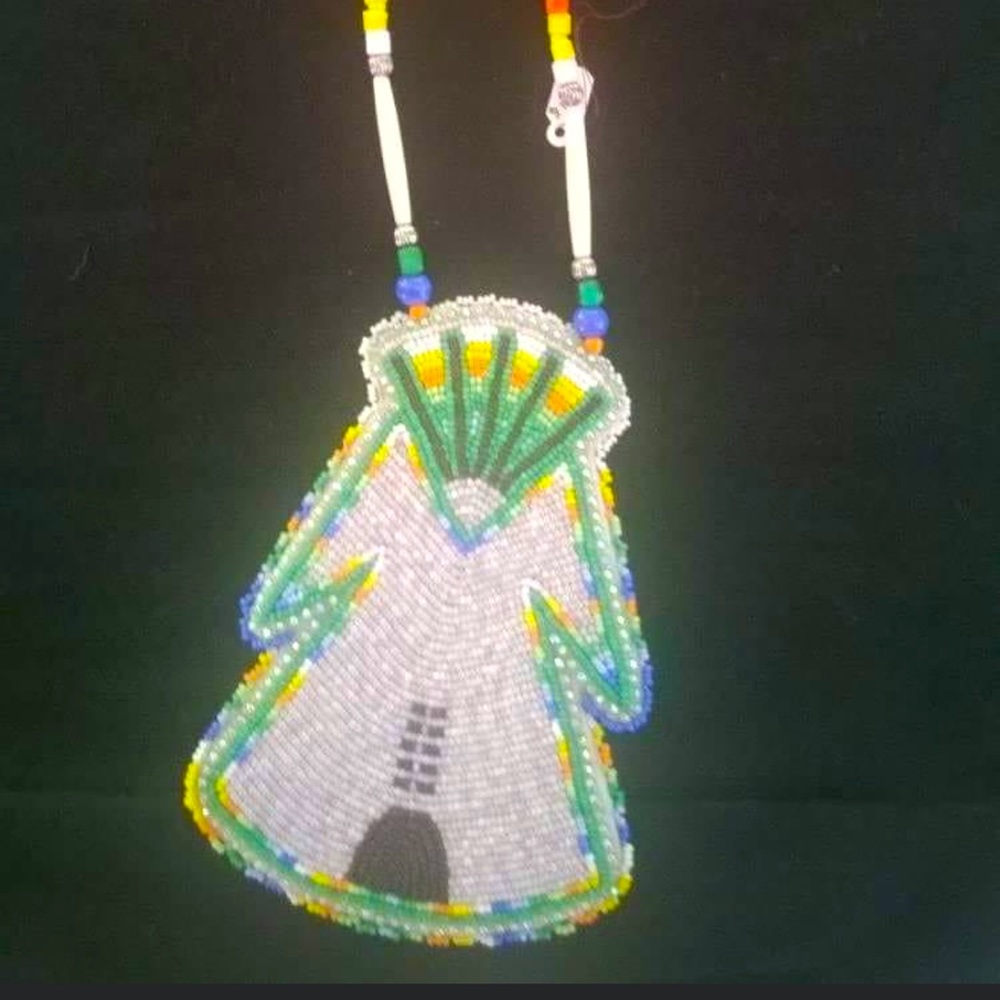 Handmade beadwork Native American tepee medallion